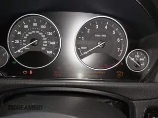 2015 BMW 4 Series 428i xDrive with VIN WBA4A7C57FD414955, listed as a IAAI auction lot 41609214 with 69,125 mi miles and . Bid and sale history available at DreamBid. Image 7.