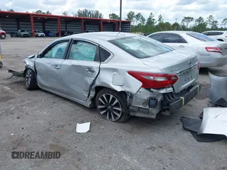 2018 Nissan Altima SR with VIN 1N4AL3AP0JC188288, listed as a IAAI auction lot 41996765 with 86,256 mi miles and . Bid and sale history available at DreamBid. Image 3.
