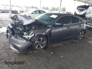 2022 Honda Insight EX with VIN 19XZE4F52NE009235, listed as a IAAI auction lot 41772288 with 115,324 mi miles and . Bid and sale history available at carsss.com. Image 18.