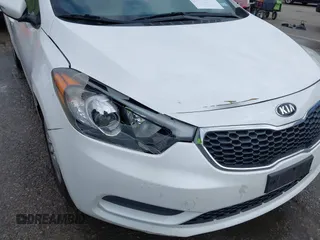 2015 Kia Forte LX with VIN KNAFX4A69F5421840, listed as a IAAI auction lot 42019236 with 147,847 mi miles. Bid and sale history available at carsss.com. Image 6.