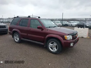 2002 Infiniti QX4 Luxury z VIN JNRDR09Y52W262189, wystawiony jako IAAI lot #41931219 z przebiegiem 180 792 mil mil oraz . Historia ofert i sprzedaży dostępna na DreamBid. Obrazek 1.