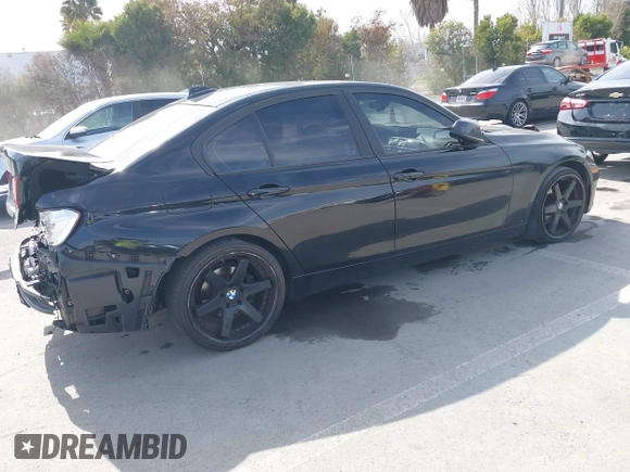 2014 BMW 3 Series 328i with VIN WBA3C1C55EK115218, listed as a IAAI auction lot 41824817 with 101,941 mi miles. Bid and sale history available at carsss.com. Image 4.