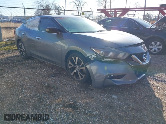 2016 Nissan Maxima Platinum with VIN 1N4AA6APXGC438961, listed as a IAAI auction lot 41535350 with 194,701 mi miles and . Bid and sale history available at DreamBid. Image 1.