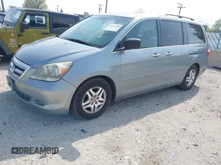 2005 Honda Odyssey EX-L with VIN 5FNRL38755B014826, listed as a IAAI auction lot 42147100 with 145,484 mi miles. Bid and sale history available at carsss.com. Image 2.