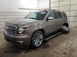 2016 Chevrolet Tahoe LTZ with VIN 1GNSKCKC3GR380962, listed as a Copart auction lot 54744665 with 124,546 mi miles and Salvage title. Bid and sale history available at DreamBid. Image 1.