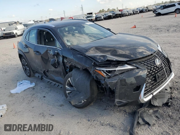 2024 Lexus UX with VIN JTHX6JBH9R2189737, listed as a Copart auction lot 77551214 with 0 mi miles and Salvage Title. Bid and sale history available at carsss.com. Image 4.