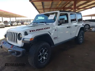 2020 Jeep Wrangler Unlimited Rubicon with VIN 1C4HJXFGXLW107958, listed as a IAAI auction lot 42058477 with 69,951 mi miles and . Bid and sale history available at DreamBid. Image 17.