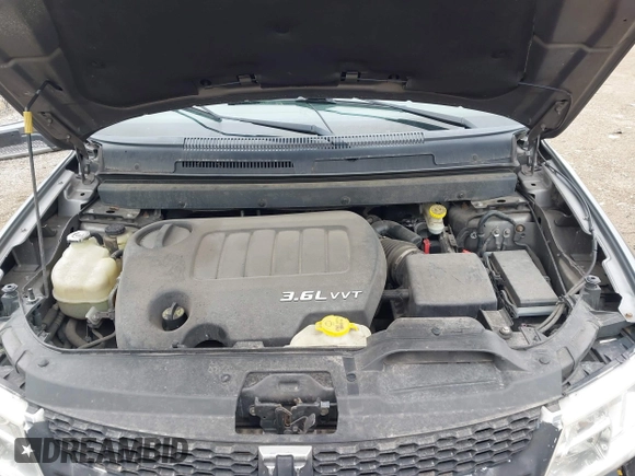 2013 Dodge Journey SXT with VIN 3C4PDDBGXDT519196, listed as a IAAI auction lot 41885545 with 185,180 mi miles and . Bid and sale history available at DreamBid. Image 10.