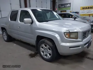 2006 Honda Ridgeline RTL with VIN 2HJYK16546H520899, listed as a IAAI auction lot 41899874 with 3,202,741 mi miles. Bid and sale history available at carsss.com. Image 1.