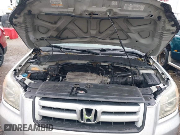 2007 Honda Pilot LX with VIN 2HKYF18157H530370, listed as a IAAI auction lot 41967033 with 214,590 mi miles and . Bid and sale history available at DreamBid. Image 10.