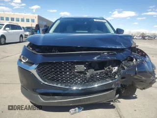 2023 Mazda CX-30 S Carbon Edition z VIN 3MVDMBCM3PM554378, wystawiony jako Copart lot #50558075 z przebiegiem 26 658 mil mil oraz Szkoda całkowita • Salvage title. Historia ofert i sprzedaży dostępna na DreamBid. Obrazek 5.