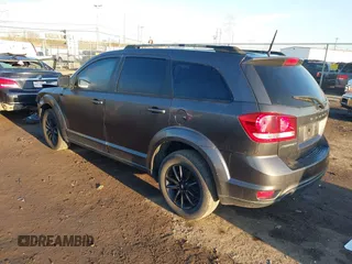 2019 Dodge Journey SE with VIN 3C4PDCBB2KT873970, listed as a IAAI auction lot 41864725 with 91,240 mi miles and . Bid and sale history available at DreamBid. Image 3.