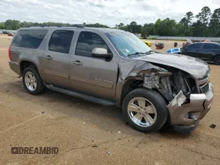 2013 Chevrolet Suburban LS z VIN 1GNSCHE00DR221307, wystawiony jako Copart lot #54684925 z przebiegiem 203 169 mil mil oraz Szkoda całkowita • Salvage title. Historia ofert i sprzedaży dostępna na DreamBid. Obrazek 4.