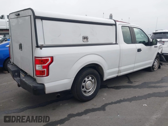 2018 Ford F-150 XL with VIN 1FTEX1CP5JKE02604, listed as a IAAI auction lot 42490050 with 171,521 mi miles and . Bid and sale history available at DreamBid. Image 4.