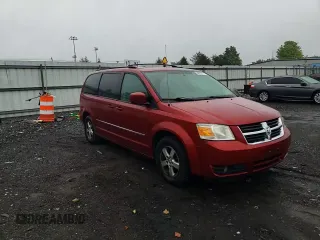 2010 Dodge Grand Caravan SXT z VIN 2D4RN5D10AR179773, wystawiony jako Copart lot #56855235 z przebiegiem 239 925 mil mil oraz Nie do naprawy • Non repairable. Historia ofert i sprzedaży dostępna na DreamBid. Obrazek 14.