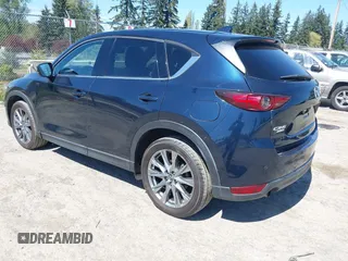 2019 Mazda CX-5 Signature with VIN JM3KFBEY7K0589236, listed as a IAAI auction lot 42078418 with 86,959 mi miles. Bid and sale history available at carsss.com. Image 3.