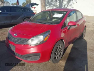 2013 Kia Rio LX with VIN KNADM4A30D6152690, listed as a IAAI auction lot 41966042 with 102,572 mi miles. Bid and sale history available at carsss.com. Image 2.