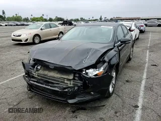 2016 Ford Fusion SE Hybrid with VIN 3FA6P0LU9GR203845, listed as a Copart auction lot 62026805 with 102,456 mi miles and Salvage title. Bid and sale history available at DreamBid. Image 13.
