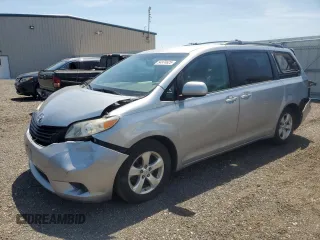 2011 Toyota Sienna LE AAS with VIN 5TDKK3DCXBS107274, listed as a Copart auction lot 54974625 with 211,176 mi miles and Salvage title. Bid and sale history available at DreamBid. Image 1.