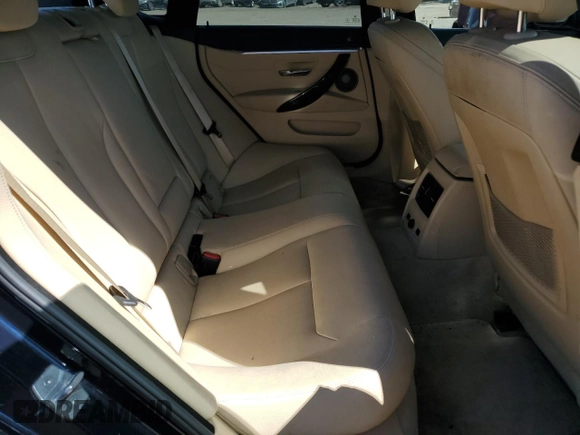 2016 BMW 4 Series 428i xDrive z VIN WBA4C9C55GG140032, wystawiony jako Copart lot #57702215 z przebiegiem 57 050 mil mil oraz Szkoda całkowita • Salvage title. Historia ofert i sprzedaży dostępna na DreamBid. Obrazek 10.