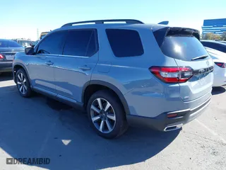 2024 Honda Pilot Touring with VIN 5FNYG1H74RB020112, listed as a IAAI auction lot 41698998 with 11,612 mi miles. Bid and sale history available at carsss.com. Image 3.