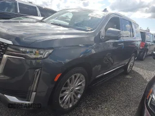 2021 Cadillac Escalade Premium Luxury z VIN 1GYS3CKL6MR218402, wystawiony jako Copart lot #74196274 z przebiegiem 43 432 mil mil oraz Szkoda całkowita • Salvage title. Historia ofert i sprzedaży dostępna na DreamBid. Obrazek 1.