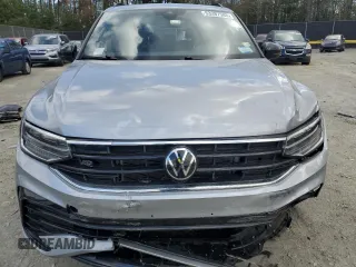 2024 Volkswagen Tiguan SE R-Line Black with VIN 3VVCB7AXXRM129869, listed as a Copart auction lot 53387585 with 8,563 mi miles and Salvage title. Bid and sale history available at DreamBid. Image 5.