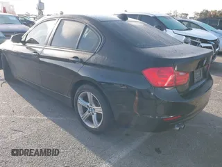 2015 BMW 3 Series 328i with VIN WBA3C1C55FK119562, listed as a IAAI auction lot 41945606 with 51,922 mi miles and . Bid and sale history available at DreamBid. Image 3.