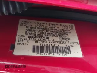 2012 Nissan Versa S with VIN 3N1BC1CP4CL367864, listed as a IAAI auction lot 41472771 with 106,438 mi miles. Bid and sale history available at carsss.com. Image 9.