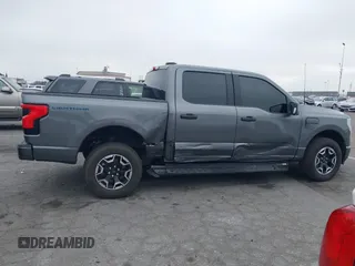 2023 Ford F-150 Lightning Pro with VIN 1FTVW1EL8PWG48559, listed as a IAAI auction lot 42033123 with 8,845 mi miles and . Bid and sale history available at DreamBid. Image 13.