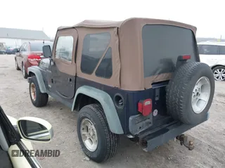 1998 Jeep Wrangler SE with VIN 1J4FY29P9WP792089, listed as a IAAI auction lot 41794793 with 200,838 mi miles. Bid and sale history available at carsss.com. Image 3.
