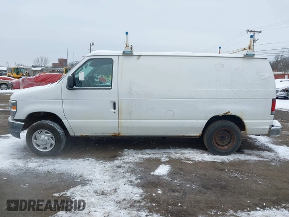2011 Ford Econoline Cargo Commercial with VIN 1FTNE1EWXBDA35585, listed as a IAAI auction lot 41349320 with 122,311 mi miles and . Bid and sale history available at carsss.com. Image 14.