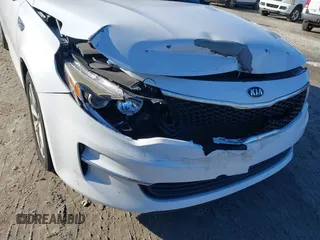 2016 Kia Optima LX with VIN 5XXGT4L36GG005859, listed as a IAAI auction lot 41053277 with 127,783 mi miles. Bid and sale history available at carsss.com. Image 18.