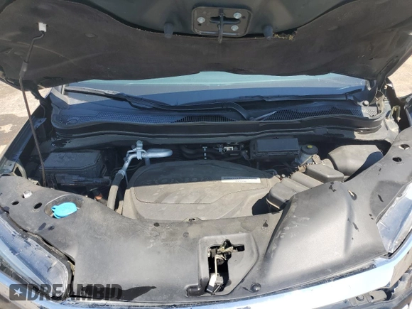 2017 Honda Pilot Touring z VIN 5FNYF6H93HB051982, wystawiony jako Copart lot #53390535 z przebiegiem Nie podano mil oraz Szkoda całkowita • Salvage title. Historia ofert i sprzedaży dostępna na DreamBid. Obrazek 12.