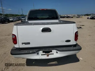 2002 Ford F-150 XL with VIN 1FTRX07W52KB08618, listed as a Copart auction lot 57941974 with 172,843 mi miles and Salvage title. Bid and sale history available at DreamBid. Image 6.