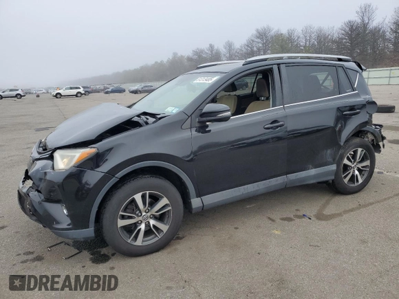 2018 Toyota RAV4 XLE with VIN 2T3RFREV8JW715099, listed as a Copart auction lot 51313485 with 140,107 mi miles and Salvage Title. Bid and sale history available at DreamBid. Image 1.