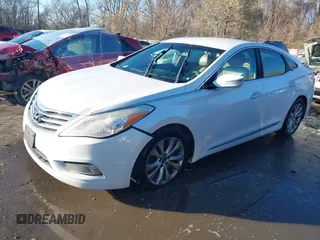 2014 Hyundai Azera with VIN KMHFG4JG6EA354949, listed as a IAAI auction lot 41034372 with 173,338 mi miles and . Bid and sale history available at DreamBid. Image 17.