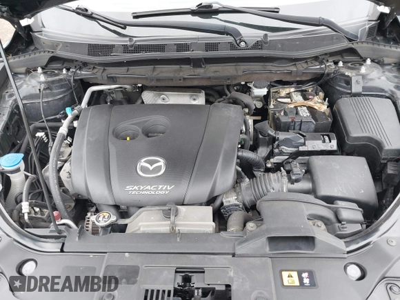 2016 Mazda CX-5 Sport with VIN JM3KE2BY4G0761933, listed as a IAAI auction lot 41709274 with 131,127 mi miles. Bid and sale history available at carsss.com. Image 10.