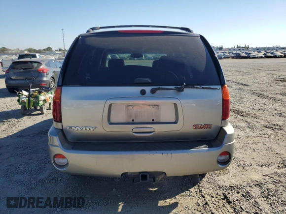 2002 GMC Envoy SLE z VIN 1GKDS13S822359901, wystawiony jako Copart lot #71940774 z przebiegiem 188 580 mil mil oraz Szkoda całkowita • Salvage title. Historia ofert i sprzedaży dostępna na DreamBid. Obrazek 6.