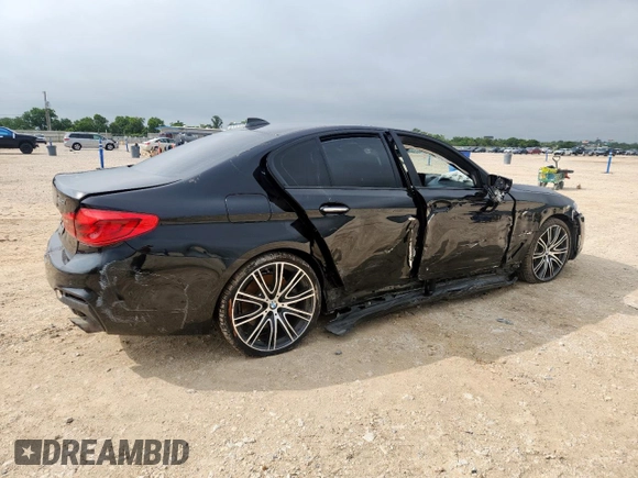 2018 BMW 5 Series 540i xDrive with VIN WBAJE7C52JWD52730, listed as a Copart auction lot 60297425 with 104,208 mi miles and Salvage title. Bid and sale history available at DreamBid. Image 3.