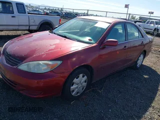 2003 Toyota Camry LE with VIN 4T1BE32K33U147710, listed as a IAAI auction lot 42184705 with 305,390 mi miles and . Bid and sale history available at DreamBid. Image 2.