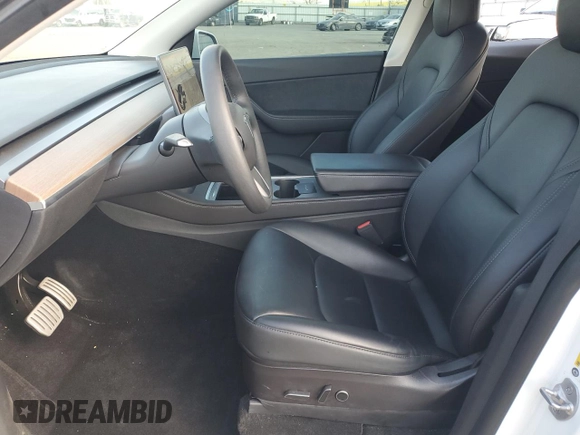 2022 Tesla Model Y Performance with VIN 7SAYGDEF1NF342071, listed as a Copart auction lot 43084905 with 30,534 mi miles and Salvage Title. Bid and sale history available at DreamBid. Image 7.