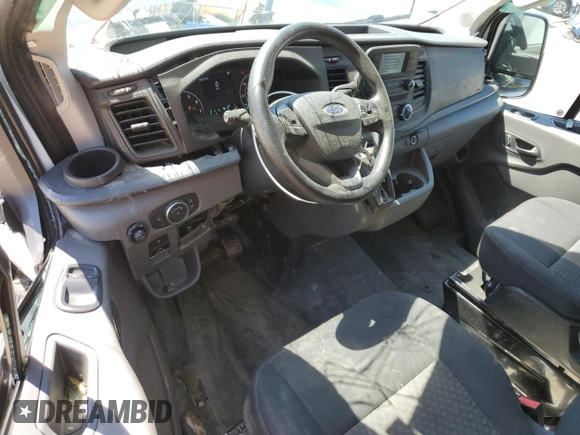 2023 Ford Transit Cargo z VIN 1FTBR1Y86PKB56878, wystawiony jako Copart lot #57893075 z przebiegiem 25 357 mil mil oraz Czysty tytuł • Clean title. Historia ofert i sprzedaży dostępna na DreamBid. Obrazek 8.