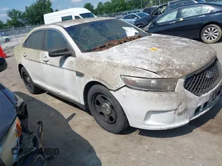 2013 Ford Police Interceptor z VIN 1FAHP2M80DG205024, wystawiony jako IAAI lot #42740282 z przebiegiem 123 705 mil mil oraz . Historia ofert i sprzedaży dostępna na DreamBid. Obrazek 1.