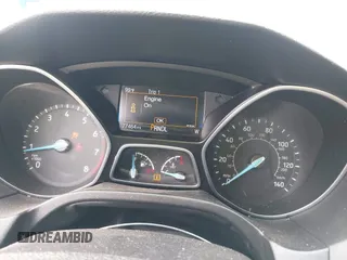 2018 Ford Focus SE with VIN 1FADP3F22JL295342, listed as a IAAI auction lot 42335881 with 77,464 mi miles and . Bid and sale history available at DreamBid. Image 7.