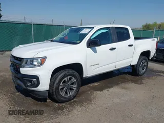 2022 Chevrolet Colorado 4WD Z71 with VIN 1GCGTDEN2N1266879, listed as a IAAI auction lot 42036942 with 98,647 mi miles and . Bid and sale history available at DreamBid. Image 2.