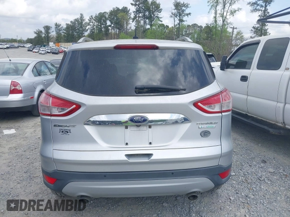 2015 Ford Escape Titanium with VIN 1FMCU0J98FUA87044, listed as a IAAI auction lot 41952096 with 257,437 mi miles. Bid and sale history available at carsss.com. Image 16.