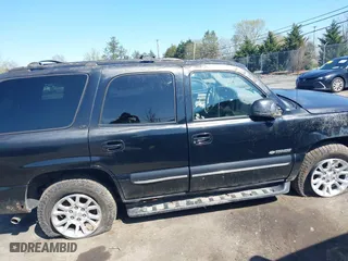 2000 Chevrolet New Tahoe LT with VIN 1GNEK13TXYJ191872, listed as a IAAI auction lot 41860033 with 1 mi miles. Bid and sale history available at carsss.com. Image 13.