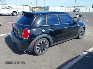 2015 MINI Hardtop 4 Door S z VIN WMWXU3C58F2B57218, wystawiony jako IAAI lot #42361437 z przebiegiem 96 984 mil mil oraz . Historia ofert i sprzedaży dostępna na DreamBid. Obrazek 4.