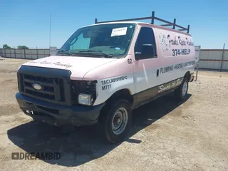 2014 Ford Econoline Cargo Commercial z VIN 1FTNE2EL2EDA81251, wystawiony jako IAAI lot #42326135 z przebiegiem 158 932 mil mil oraz . Historia ofert i sprzedaży dostępna na DreamBid. Obrazek 2.